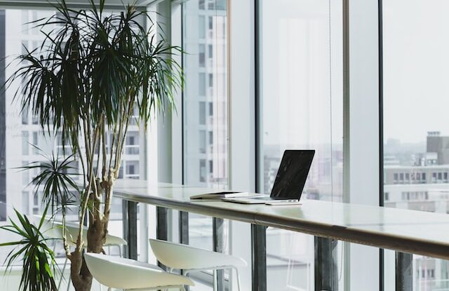Clean office space with large clear glass windows